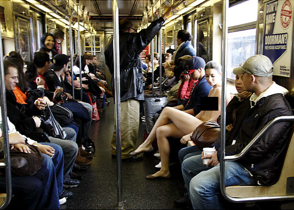 Photographer Erica Simone sits on the bus.